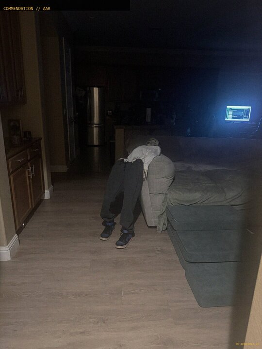Skeleton intruder sprawled over the couch