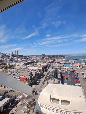 Aerial view of San Francisco streets and buildings from a Ferris wheel cabin
